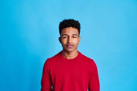 Smiling black man in studio Stock Photos