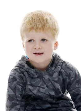 Smiling blond boy Stock Photos