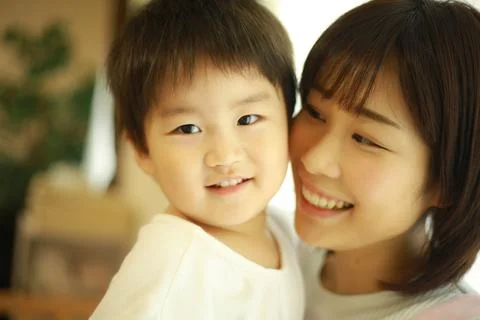 Smiling boy and nursery teacher image Stock Photos