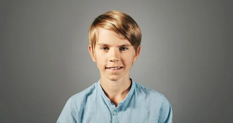 Smiling Boy Isolated On Grey Portrait 動画素材 115325307