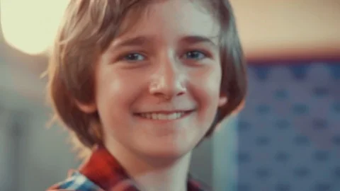 Smiling boy looking at the camera Stock Footage 75781991