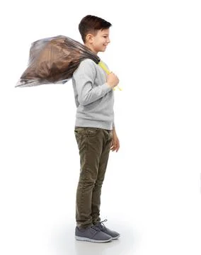Smiling boy with paper garbage in plastic bag Stock Photos