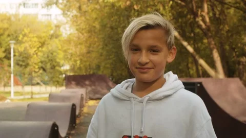 Smiling boy in the park Stock Footage 143791301