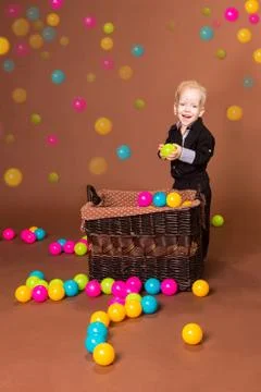 Smiling boy with small balls Stock Photos
