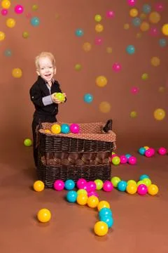 Smiling boy with small balls Stock Photos