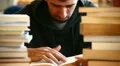 Smiling boy studying HD Footage