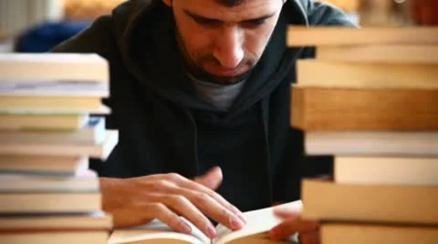 Smiling boy studying Stock Footage 10895248
