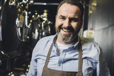 Smiling brewery worker 스톡 사진