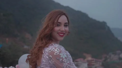 Smiling Bride Looking Over Shoulder – Romantic Wedding or Engagement Portrait Stock Footage 314622908