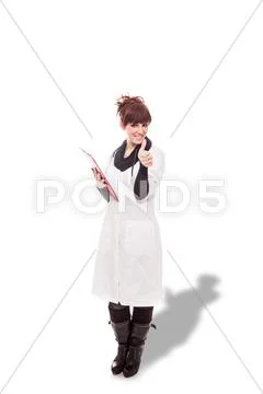 Smiling brunette female doctor with message board Stock Photos