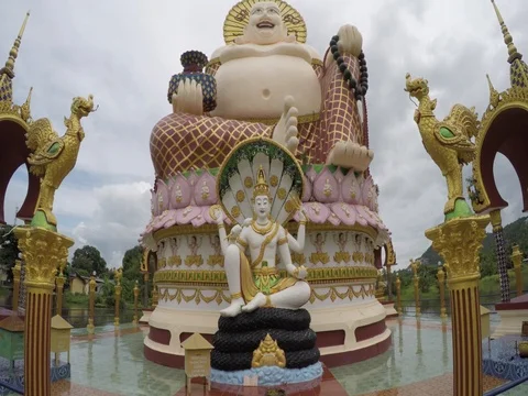Smiling Buddha of wealth statue Stock Footage 72239481