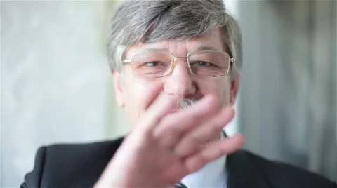 Smiling businessman waving Stock Footage 67514060