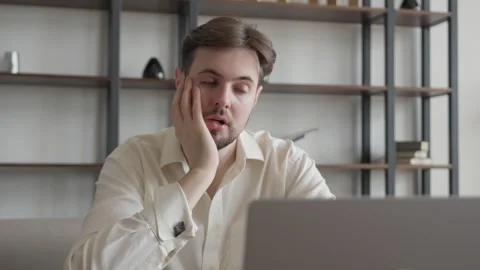 Smiling Businessman Working on Laptop Computer in Office Stock Footage 295186543