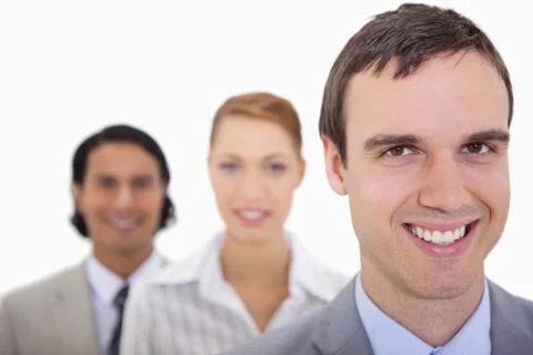 Smiling businesspartner lined up Stock Photos