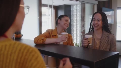 Smiling cafe customers getting coffee from barista on the go Stock Footage 244601682