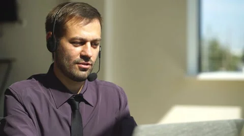Smiling call center executive Stock Footage 67659348