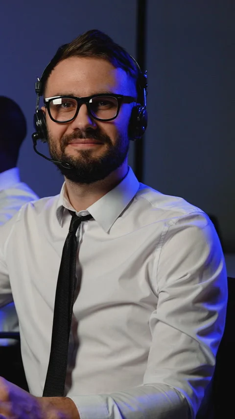 Smiling call center operator assisting customers remotely Stock Footage 305025711