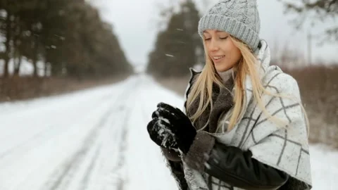 Smiling at the camera charmingly, Christmas holidays Stock Footage 292152408