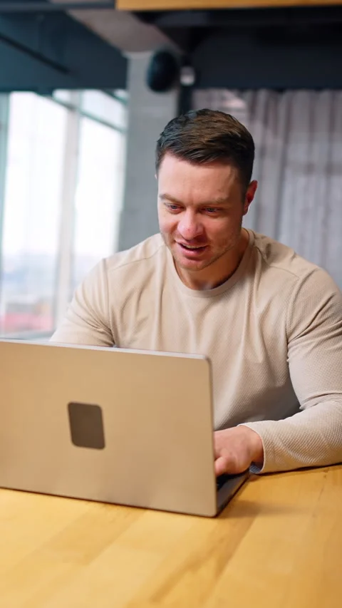 Smiling Caucasian man opening his laptop and starting work. Person working Stock Footage 325040369
