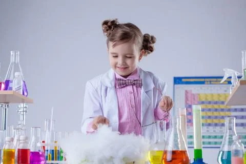 Smiling chemist successfully conducted experiment Stock Photos