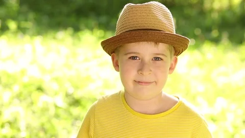 A smiling child in a hat Stock Footage 78659479