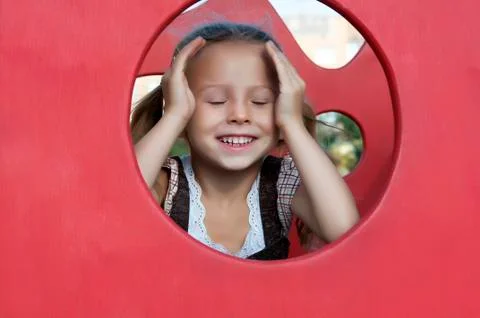 Smiling child playing Stock Photos