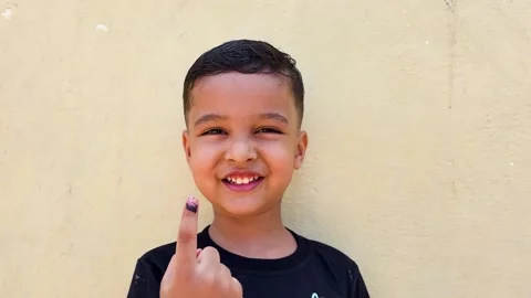 Smiling Child Showing Finger Mark After Polio Vaccination During Immunization Vídeos de archivo 340958516