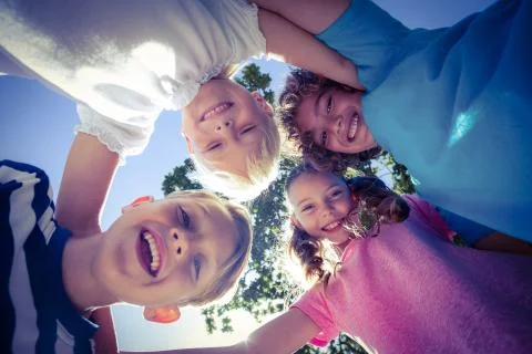 Smiling children looking down the camera Stock Photos