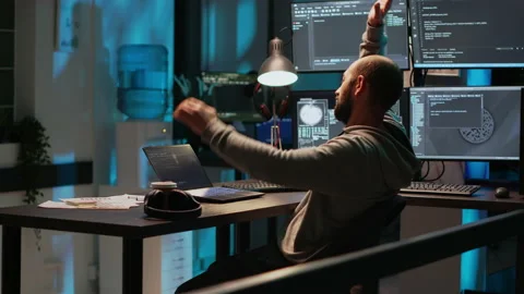 Smiling coder feeling content about programming achievement Stock Footage 229332832