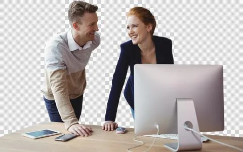 Smiling colleagues discussing over computer at table Stock Photos