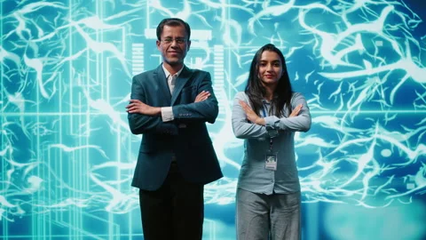 Smiling colleagues working with AI machine learning algorithms Stock Footage 278621908