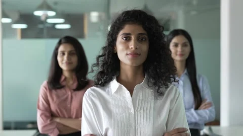 Smiling confident three young pretty Indian woman looking at camera. Видео 170427026
