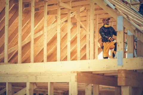 Smiling Construction Contractor Inside Newly Constructed Building Stock Photos