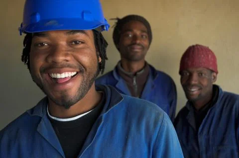 Smiling construction workers Stock Photos