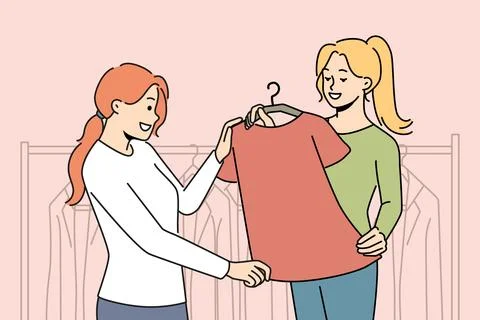 Smiling consultant help client with clothes choice Illustrazione stock