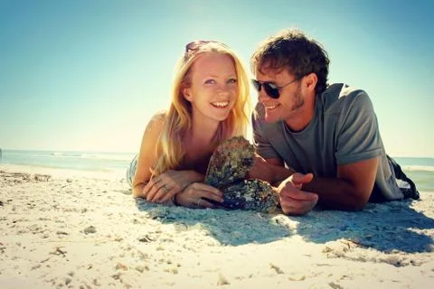 Smiling couple at beach Stock Photos