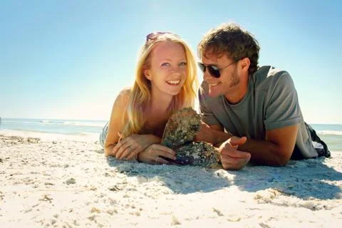 Smiling couple at beach Stock Photos