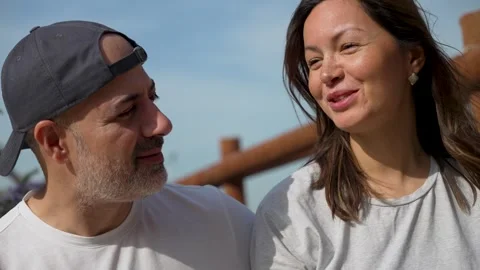Smiling Couple Looking at Each Other Outdoors Stock Footage 306732633