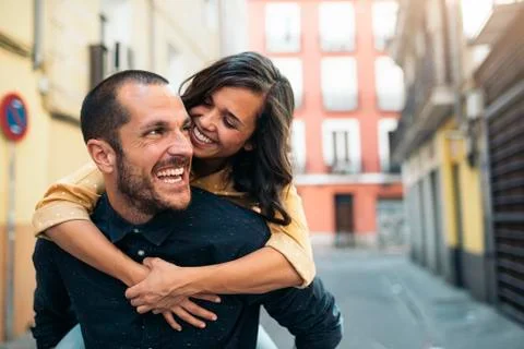 Smiling couple of lovers having fun. Stock Photos