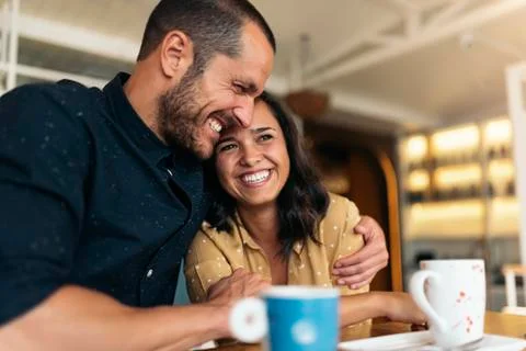 Smiling couple of lovers having fun. Stock Photos