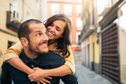 Smiling couple of lovers having fun. Stock Photos
