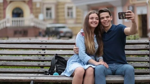 Smiling couple making self portrait on smartphone Video stock 76162405