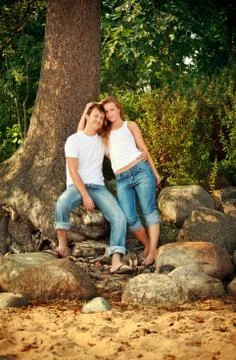 Smiling couple next tree Stock Photos