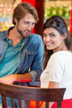 Smiling couple at a restaurant Stock Photos