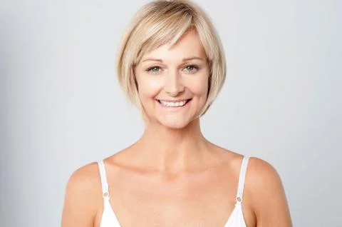 Smiling cute  lady facing camera Stock Photos