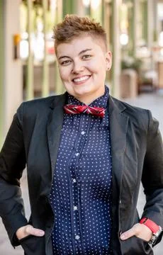 Smiling Dapper Gender Fluid Young Woman Stock Photos