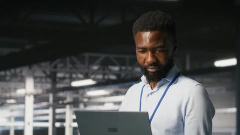 Smiling data center engineering team on industrial platform Stock Photos
