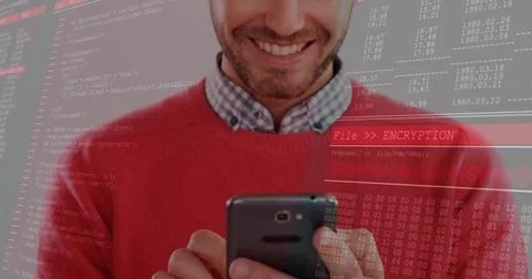 Smiling developer in red sweater, holding smartphone in cyber office, with Stockfoto's