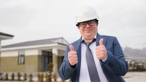 Smiling director expresses her approval by showing thumbs up Stock Footage 268382797