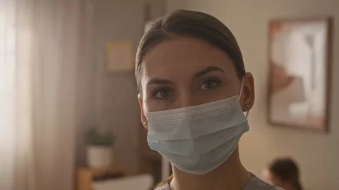 Smiling Doctor Looking at Camera Video stock 335885169